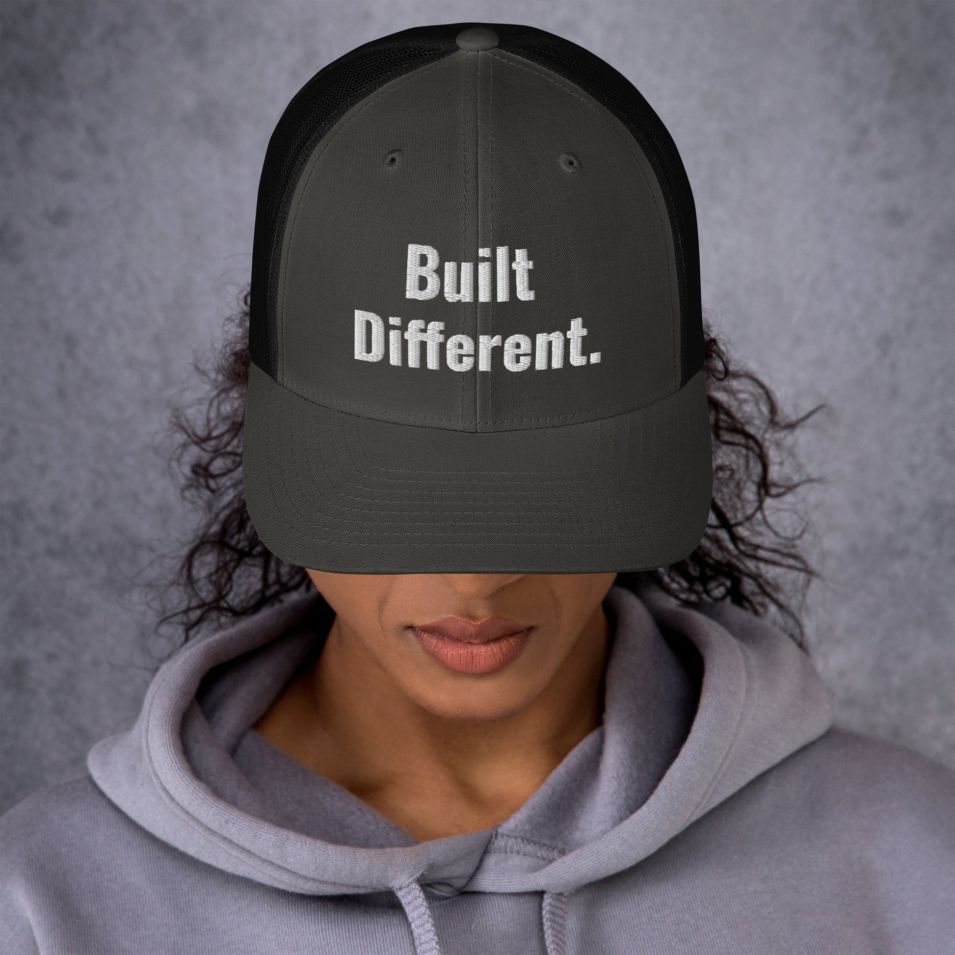 “BUILT DIFFERENT.” Trucker Cap | PeakFit Apparel for athletes | PeakFit Apparel