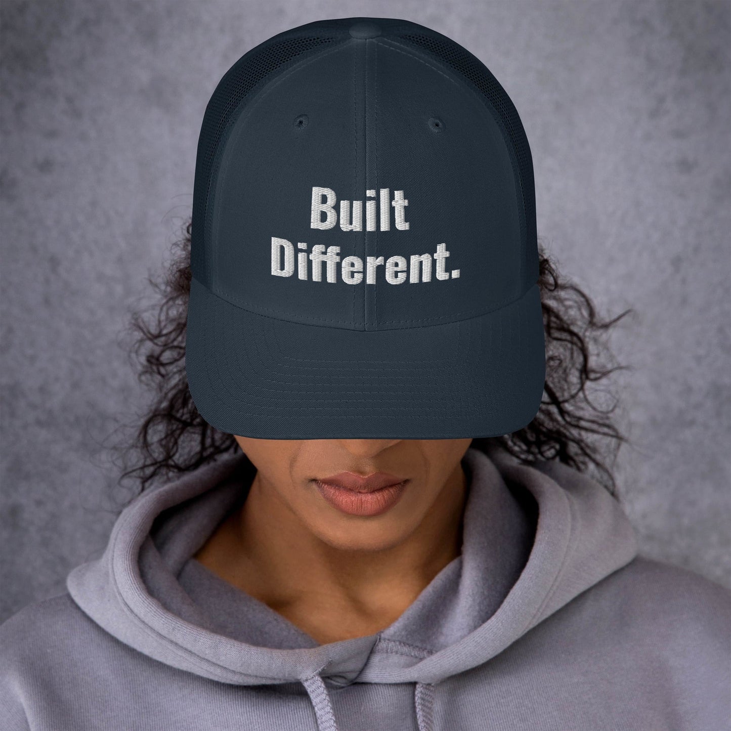 “BUILT DIFFERENT.” Trucker Cap | PeakFit Apparel for athletes | PeakFit Apparel