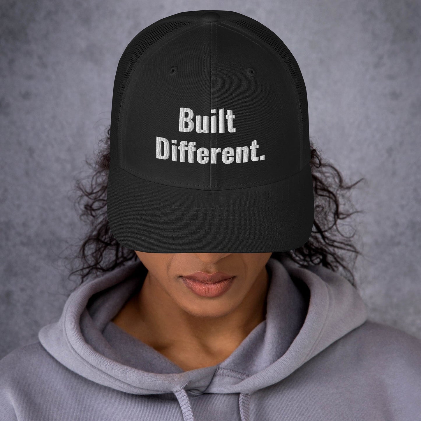“BUILT DIFFERENT.” Trucker Cap | PeakFit Apparel for athletes | PeakFit Apparel