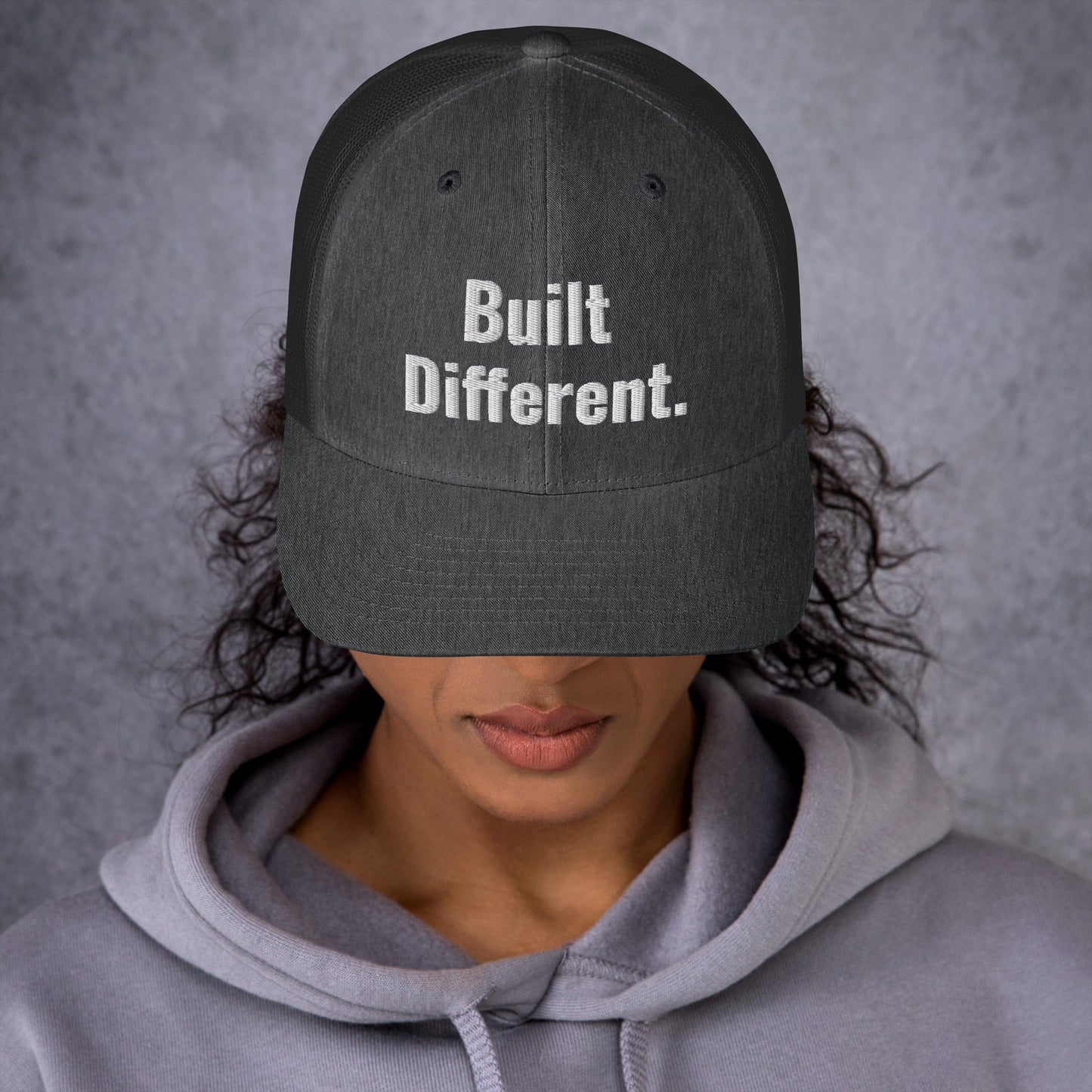 “BUILT DIFFERENT.” Trucker Cap | PeakFit Apparel for athletes | PeakFit Apparel