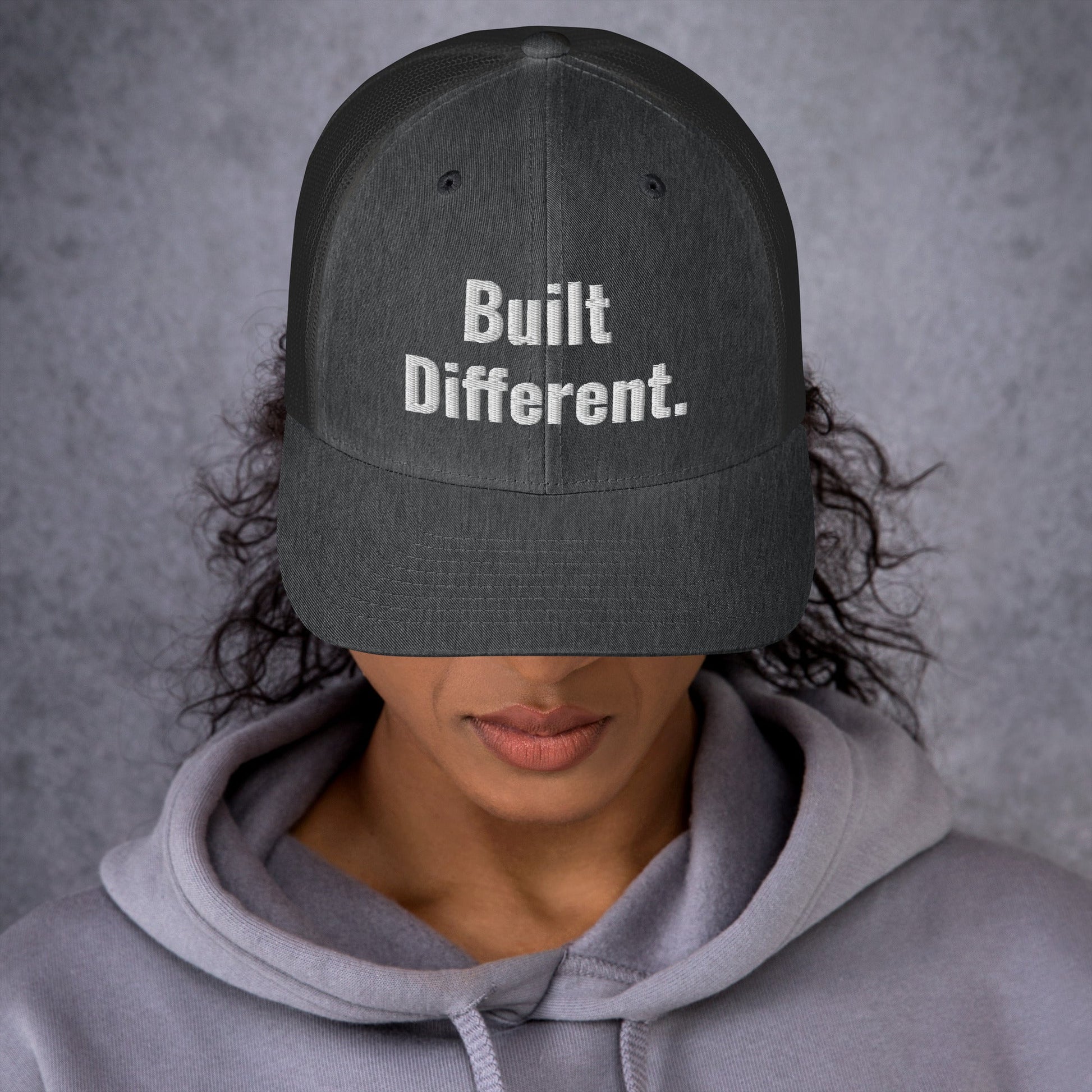 “BUILT DIFFERENT.” Trucker Cap | PeakFit Apparel for athletes | PeakFit Apparel